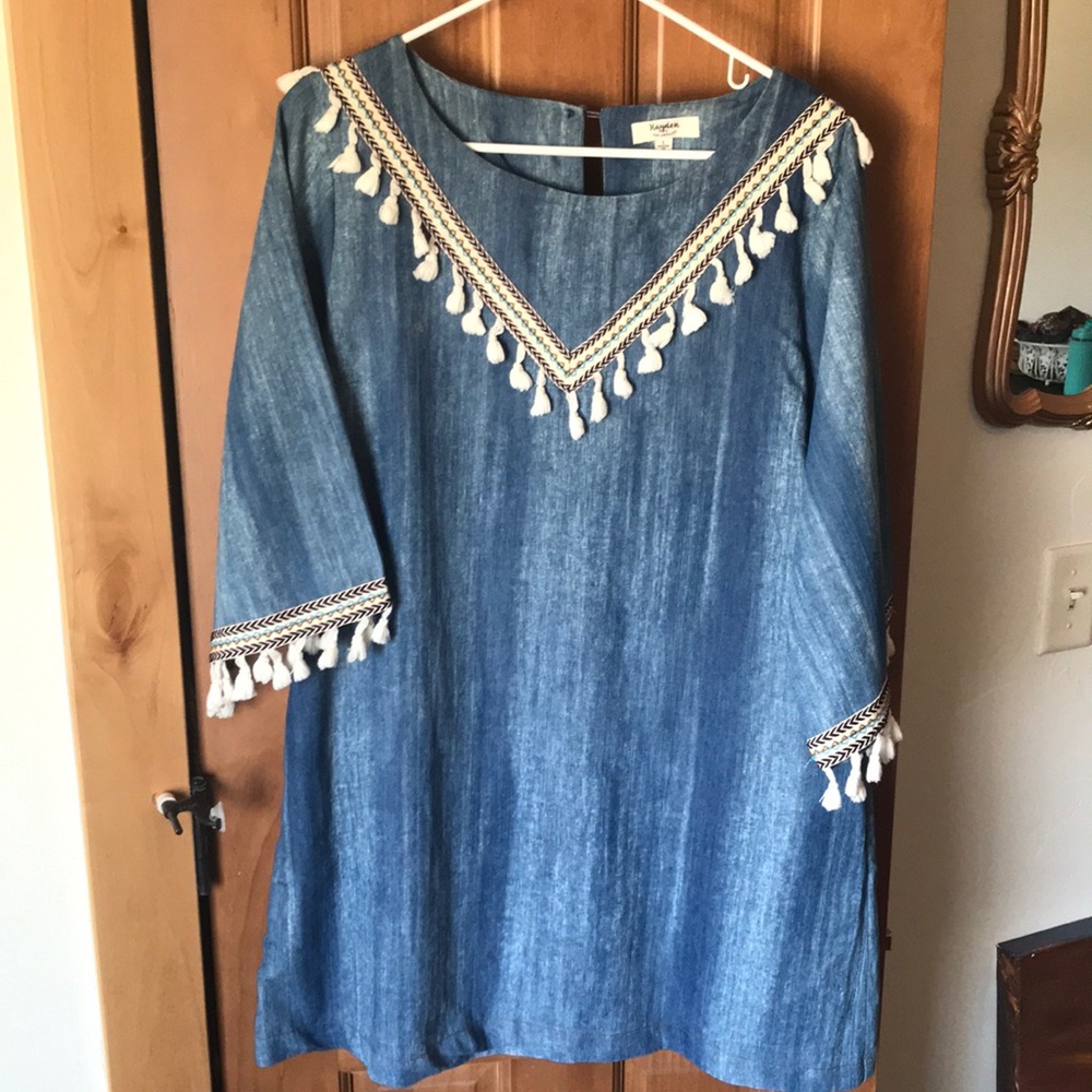 Denim dress with fringe.